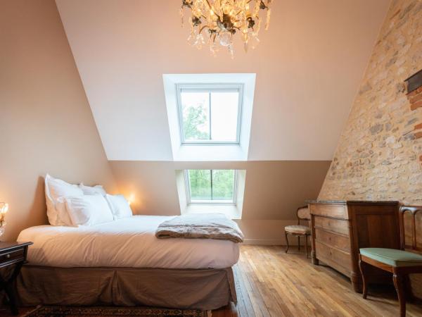 Domaine de Charnay - Résidence de charme : photo 1 de la chambre suite lit king-size
