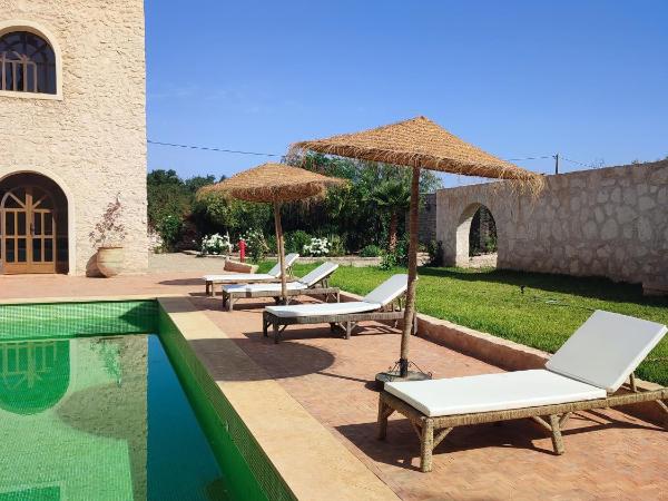 Riad Bini-Ddik : photo 4 de la chambre chambre lit king-size - vue sur piscine