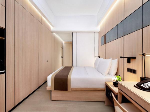 Harbour Plaza Metropolitan Shanghai : photo 3 de la chambre chambre lit king-size deluxe