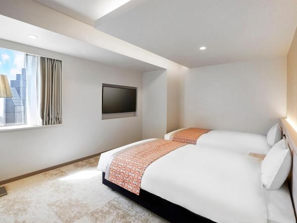 Daiwa Roynet Hotel Nagoya Shinkansenguchi : photo 5 de la chambre chambre lits jumeaux supérieure