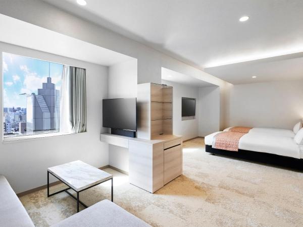 Daiwa Roynet Hotel Nagoya Shinkansenguchi : photo 1 de la chambre chambre lits jumeaux supérieure