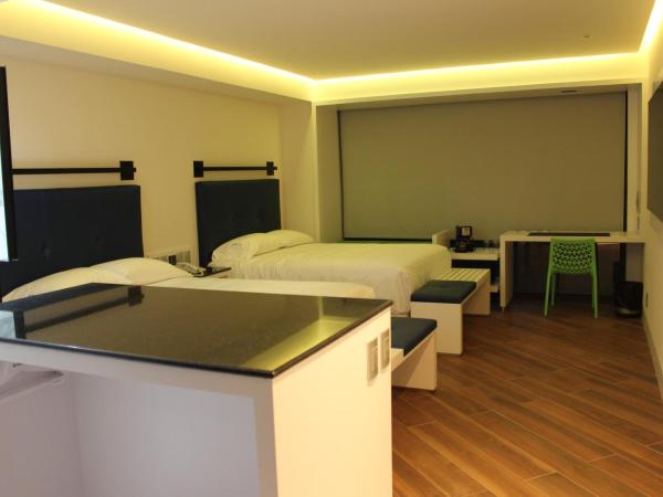 WeEnjoy Hotels Grand Prix Aeropuerto CDMX : photo 8 de la chambre chambre quadruple classique