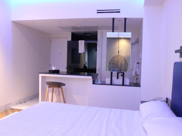 WeEnjoy Hotels Grand Prix Aeropuerto CDMX : photo 3 de la chambre suite