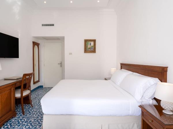 Hotel Syrene : photo 5 de la chambre chambre double ou lits jumeaux avec balcon - vue sur jardin