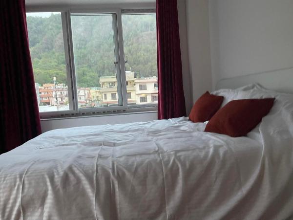 Mount Star Homestay : photo 1 de la chambre chambre lits jumeaux avec balcon