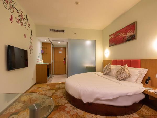 Shanshui Trends Hotel - Huaqiangbei : photo 2 de la chambre chambre romantique avec lit rond