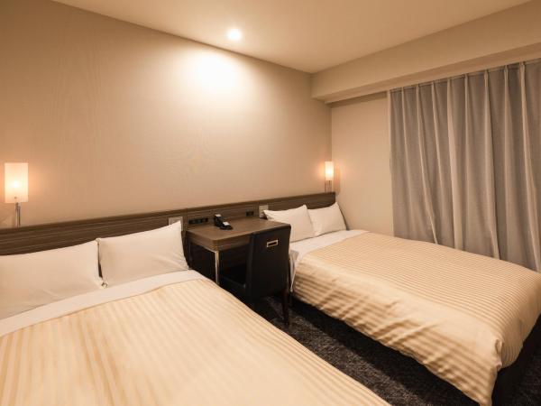 Sotetsu Fresa Inn Shimbashi Hibiyaguchi : photo 1 de la chambre chambre lits jumeaux - non-fumeurs