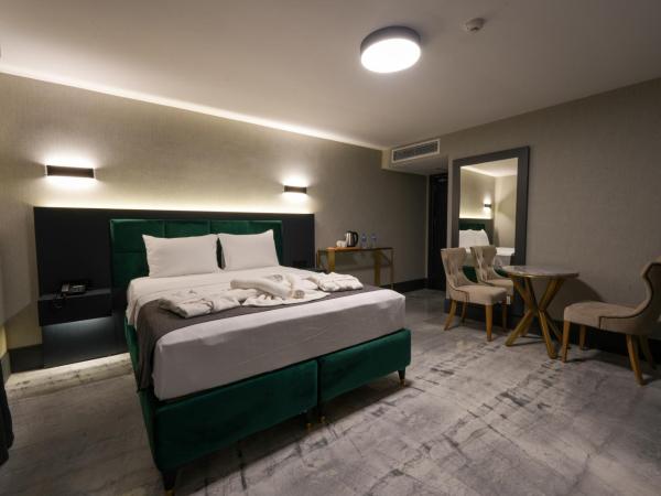 Hotel Kurucesme Business : photo 1 de la chambre chambre double deluxe avec baignoire