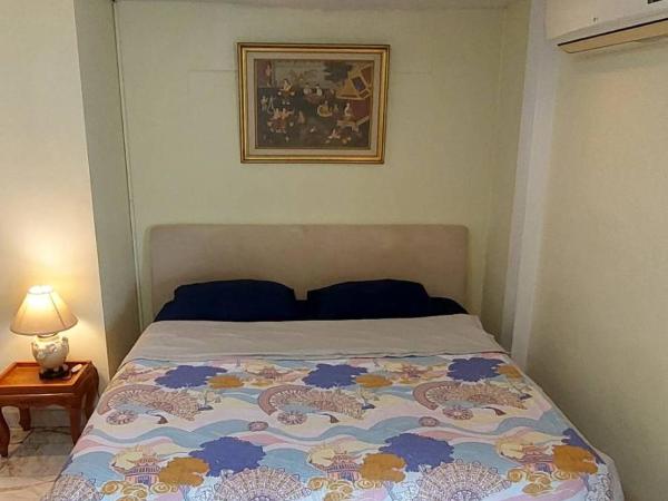 Tientong Guesthouse : photo 1 de la chambre chambre lit king-size deluxe avec balcon