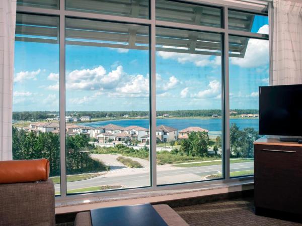 TownePlace Suites by Marriott Orlando Theme Parks Lake Buena Vista : photo 4 de la chambre suite 1 chambre lit king-size avec canapé-lit