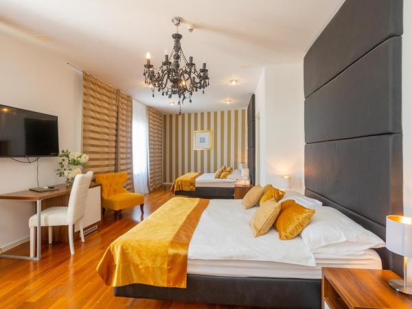 Perla Resort : photo 2 de la chambre chambre quadruple de luxe avec balcon et vue sur la mer