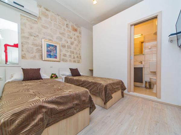 Apartments & Rooms Orlando : photo 1 de la chambre chambre double ou lits jumeaux - annexe