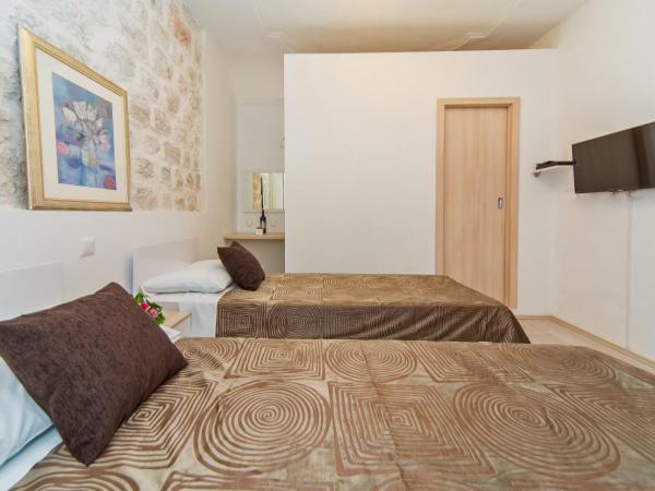 Apartments & Rooms Orlando : photo 2 de la chambre chambre double ou lits jumeaux - annexe