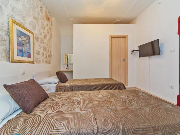 Apartments & Rooms Orlando : photo 5 de la chambre chambre double ou lits jumeaux - annexe