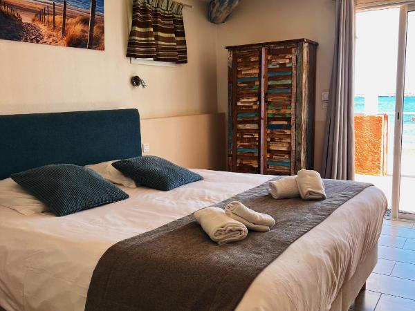 Hotel La Potiniere : photo 1 de la chambre chambre supérieure - vue sur mer - rez-de-chaussée