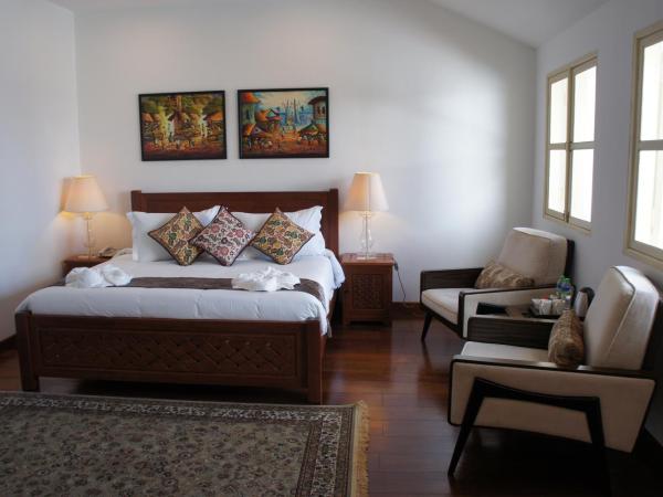 Heeren Palm Suites : photo 1 de la chambre suite junior de luxe