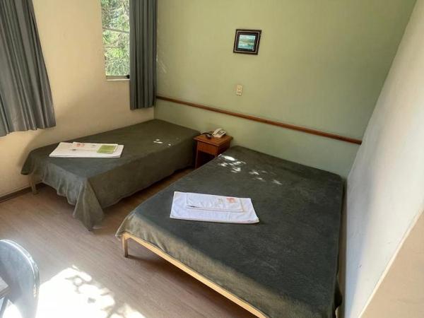 Hara Palace Hotel : photo 3 de la chambre chambre triple avec 1 lit simple et 1 lit double