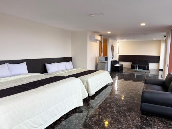 Puebla Inn Express : photo 1 de la chambre suite lit queen-size deluxe