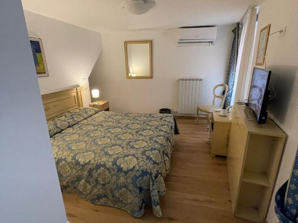 Albergo Casa Peron : photo 9 de la chambre chambre double ou lits jumeaux avec salle de bains privative