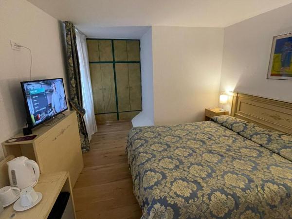 Albergo Casa Peron : photo 8 de la chambre chambre double ou lits jumeaux avec salle de bains privative