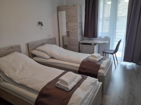 Orion Panzió : photo 1 de la chambre chambre lits jumeaux
