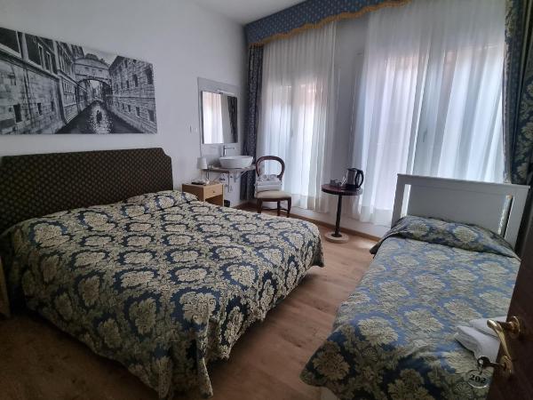 Albergo Casa Peron : photo 2 de la chambre chambre triple avec salle de bains commune