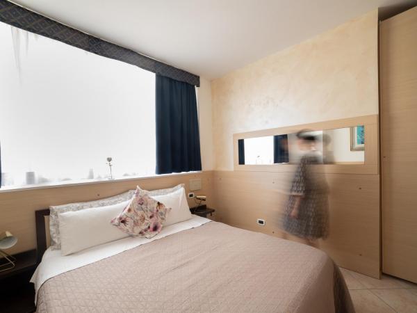 Casa Merano Residence & Ristorante Bibione Centro : photo 1 de la chambre chambre double