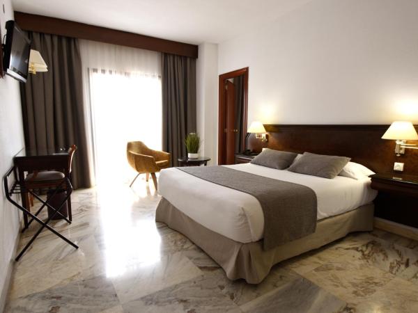 Turia Valencia : photo 1 de la chambre chambre lit queen-size supérieure avec parking gratuit