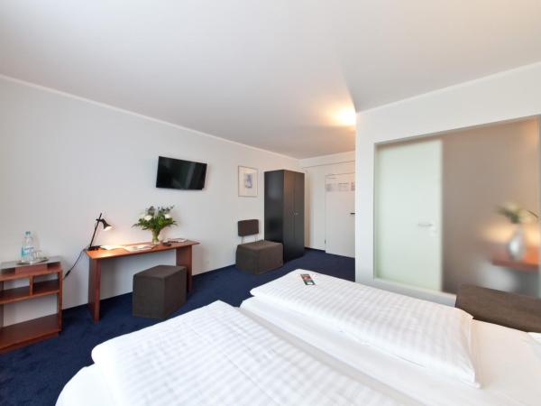Novum Hotel Aviva Leipzig Neue Messe : photo 2 de la chambre chambre double confort