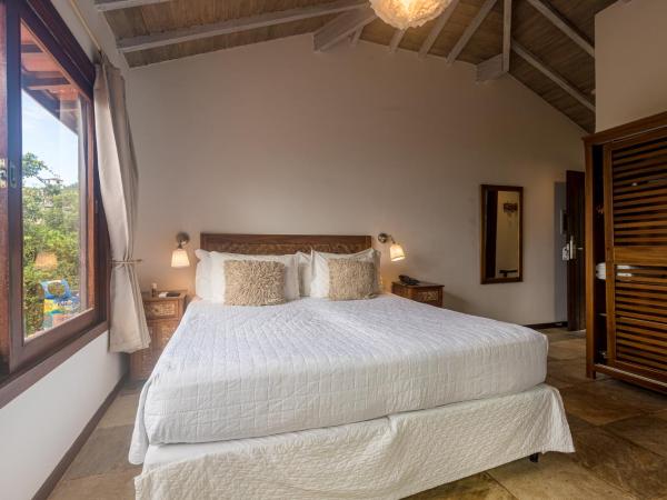 La Pedrera Small Hotel & Spa : photo 2 de la chambre chambre de luxe avec vue sur mer