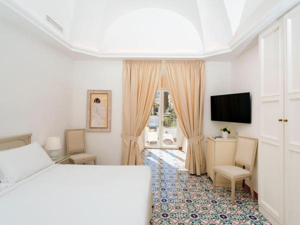 Hotel Syrene : photo 1 de la chambre chambre quadruple avec terrasse