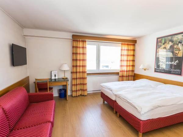 Hôtel du Rhône : photo 4 de la chambre chambre triple