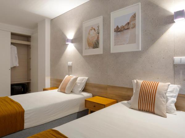 Hotel Made inn Faro : photo 1 de la chambre chambre familiale supérieure