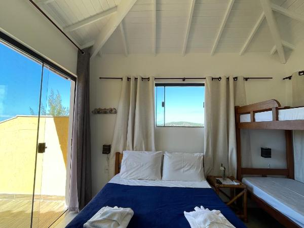 Pousada Mar'Tito Forno : photo 3 de la chambre chambre quadruple avec balcon