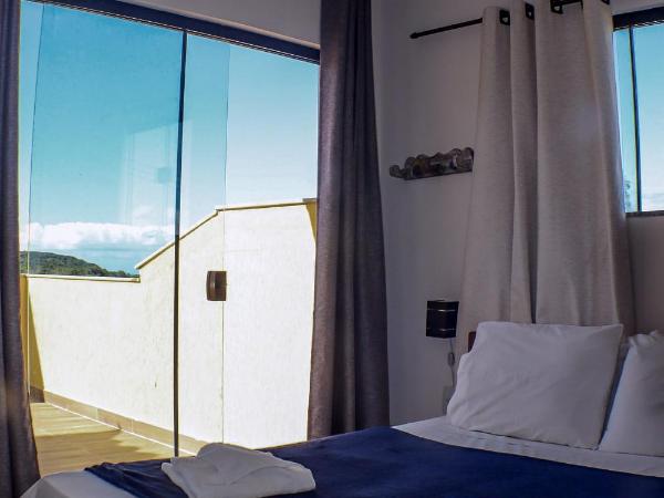 Pousada Mar'Tito Forno : photo 4 de la chambre chambre quadruple avec balcon