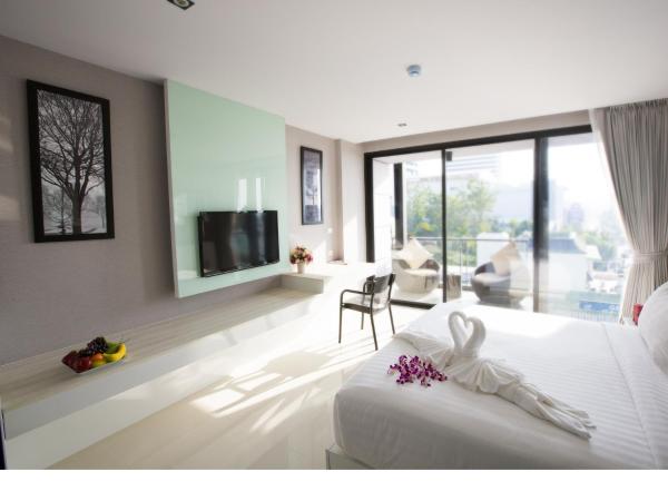 Serenotel Pattaya : photo 3 de la chambre chambre double deluxe - vue partielle sur mer