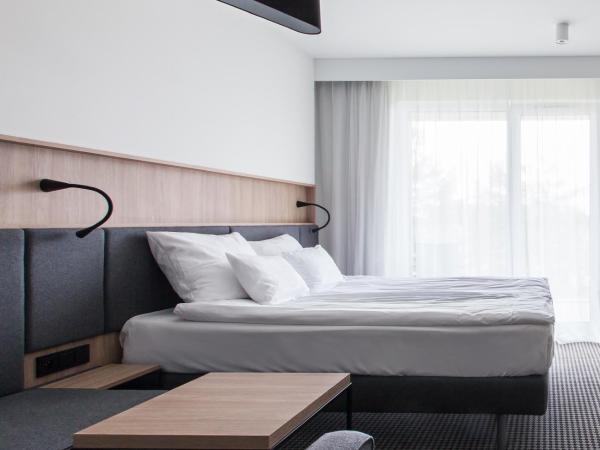 Shuum Boutique Wellness Hotel : photo 2 de la chambre chambre double avec lit d'appoint