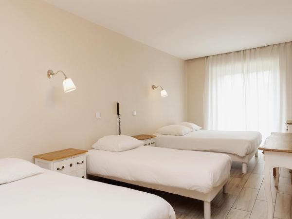 Coq Hotel : photo 6 de la chambre chambre quadruple
