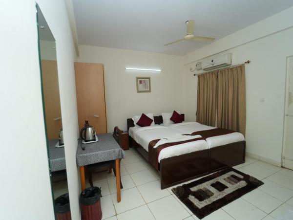 The Altruist Business Stays Bellandur-1 : photo 2 de la chambre chambre lits jumeaux deluxe
