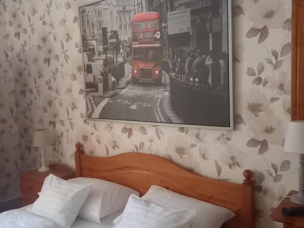 Európa Panzió : photo 5 de la chambre chambre quadruple