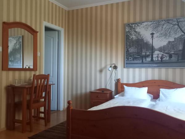 Európa Panzió : photo 2 de la chambre chambre quadruple