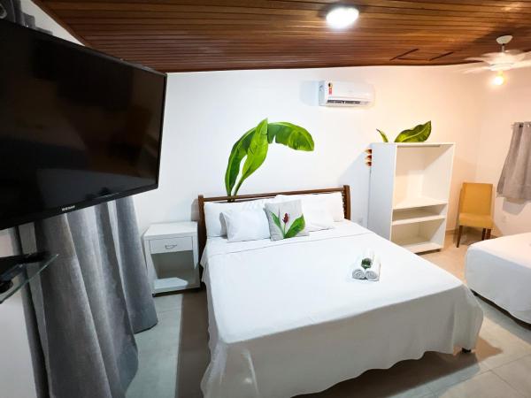 Pousada Praia e Conforto : photo 4 de la chambre chambre double supérieure