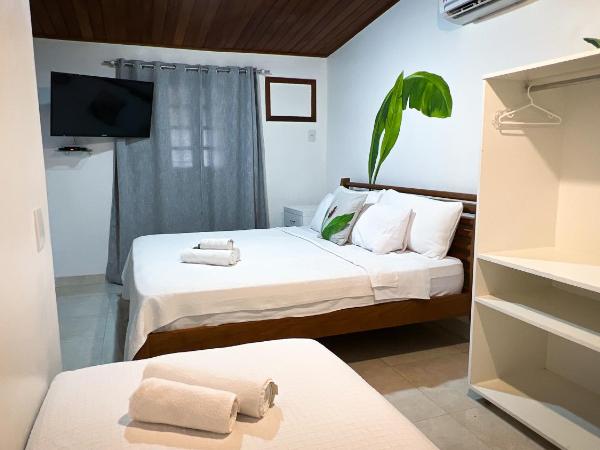 Pousada Praia e Conforto : photo 8 de la chambre chambre triple supérieure