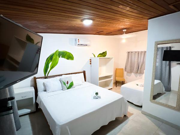 Pousada Praia e Conforto : photo 7 de la chambre chambre triple supérieure