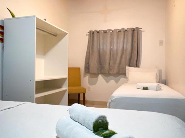 Pousada Praia e Conforto : photo 10 de la chambre chambre triple supérieure