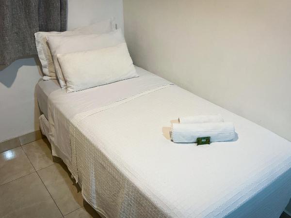 Pousada Praia e Conforto : photo 9 de la chambre chambre triple supérieure