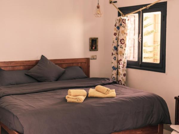 The Kozyhome : photo 1 de la chambre chambre double ou lits jumeaux deluxe avec balcon