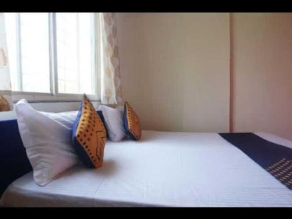 OYO Flagship Hotel Chalukya Executive : photo 7 de la chambre chambre triple classique