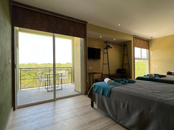 LOL-HA Hotel Boutique : photo 3 de la chambre chambre lits jumeaux - vue sur jardin