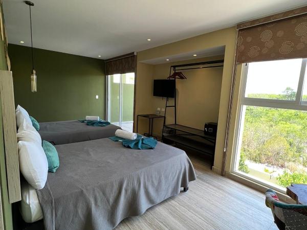 LOL-HA Hotel Boutique : photo 2 de la chambre chambre lits jumeaux - vue sur jardin